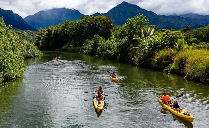 group kayaking on the Hanalei river